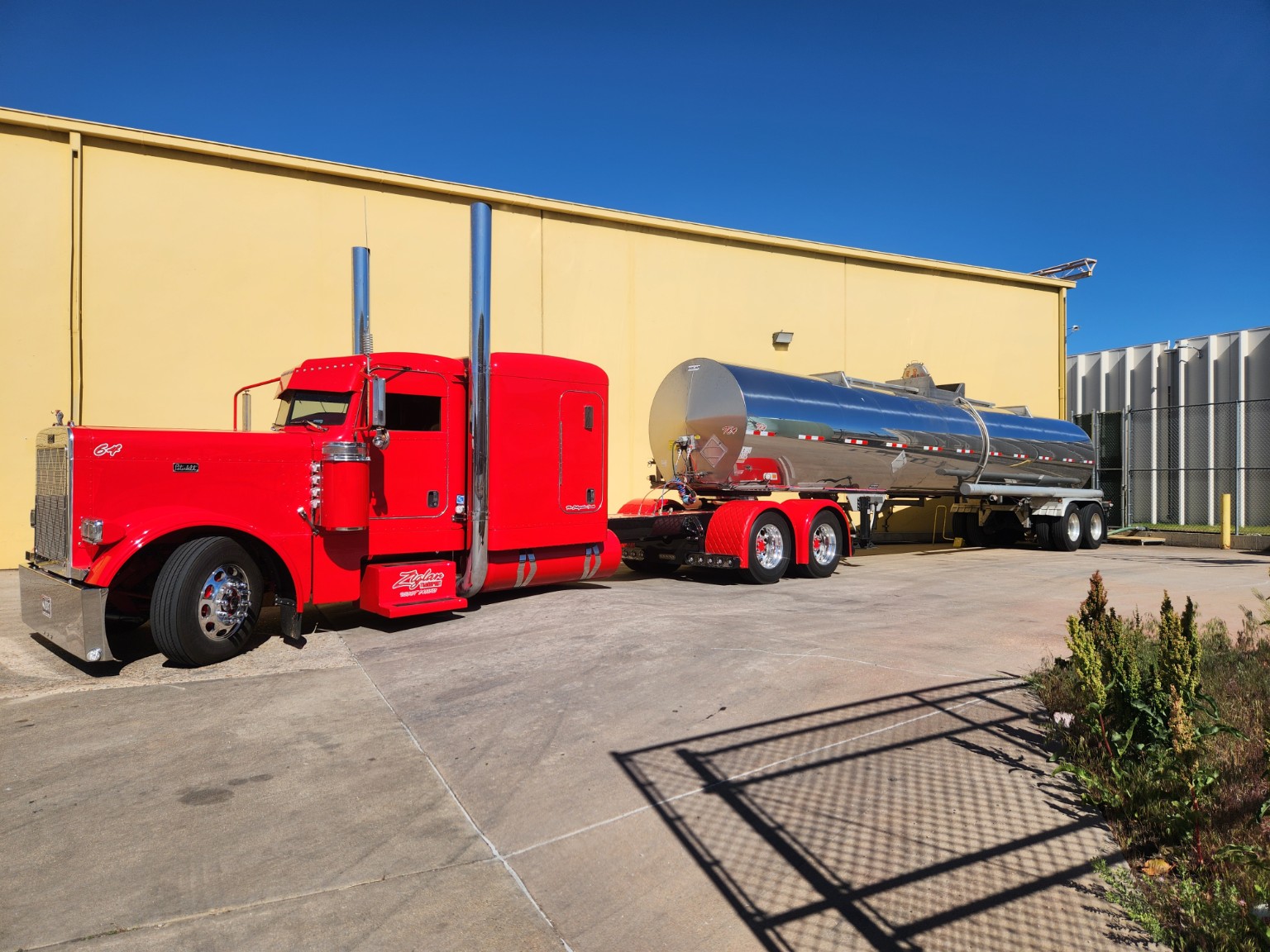 Ziglar Transport's red flagship Peterbilt and polished tanker